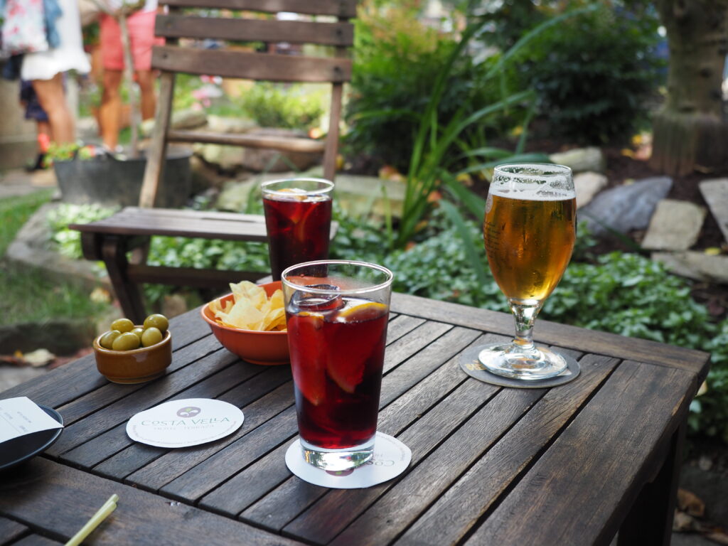 Glasses of tinto Serrano and cerveza at Costa Vella garden cafe in Santiago 