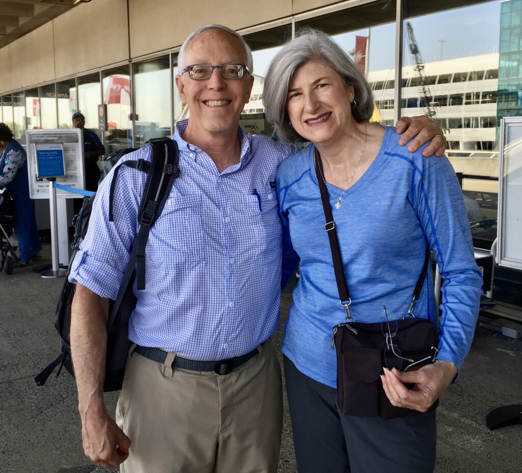 Helen and Wick dressed in Camino clothes at the airport in North Carolina to fly to Spain