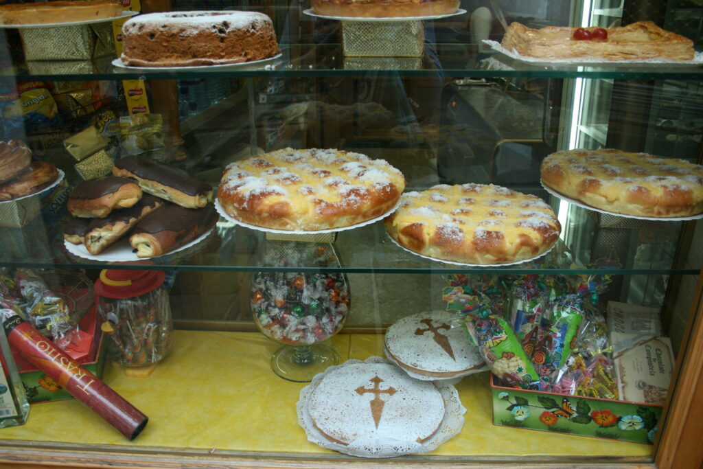 bakery window in Santiago showing cakes and pastries ready to enjoy