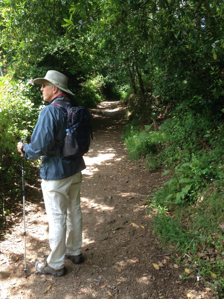 Wick in hiking clothes on the Camino carrying a daypack